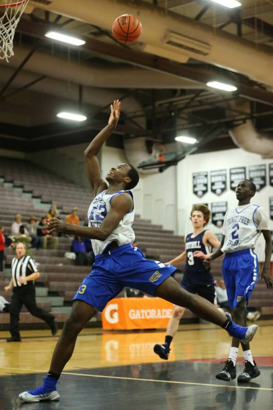 Trinity’s Zaba Bangala (13) shoots the ball against Foothill in the Las Vegas Prep Cha ...