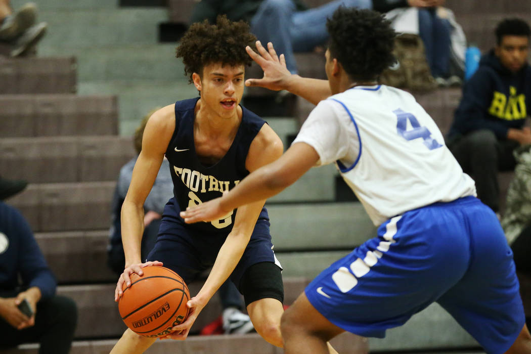 Foothill’s Jace Rocequemore (22) looks for an open play against Trinity’s Jose C ...