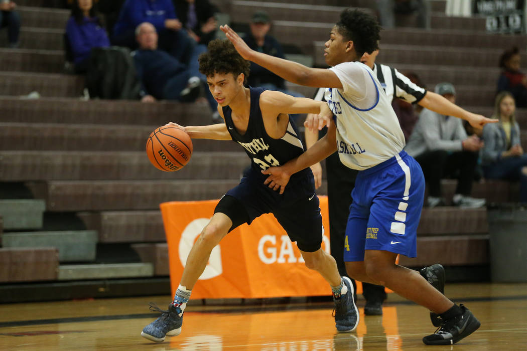 Foothill’s Jace Rocequemore (22) drives the ball under pressure from Trinity’s J ...