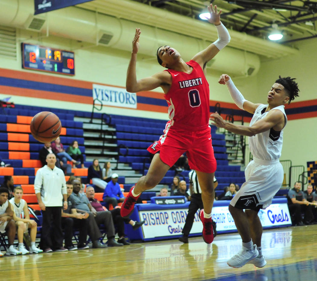 Liberty’s Julian Strawther (0) draws a foul in the first quarter of a game between Lib ...
