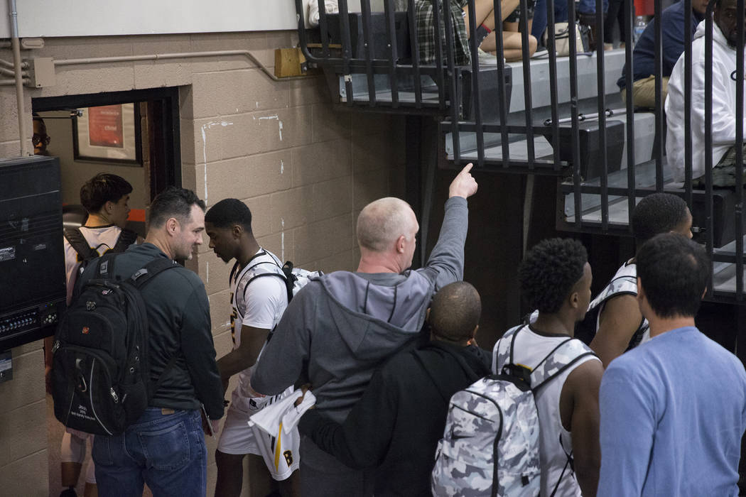 Bonanza head coach Dan Savage, middle, points at Sierra Vista fans after the Bengals game wi ...