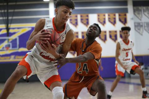 Chaparral’s Sameal Anderson (24) grabs the ball against pressure from Legacy’s A ...