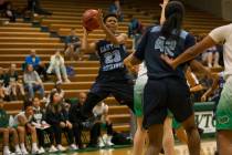 Canyon Springs guard Kayla Johnson (23) takes a shot against Green Valley during the first h ...