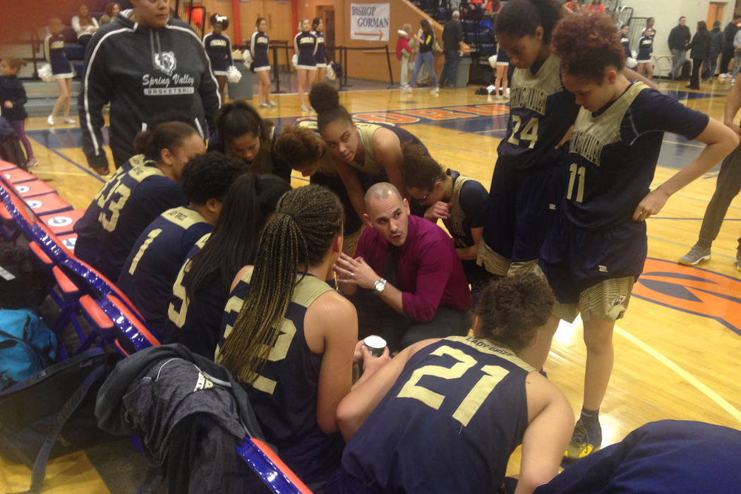 Spring Valley coach Billy Hemberger talks to his team during a timeout on Wednesday, Jan. 16 ...