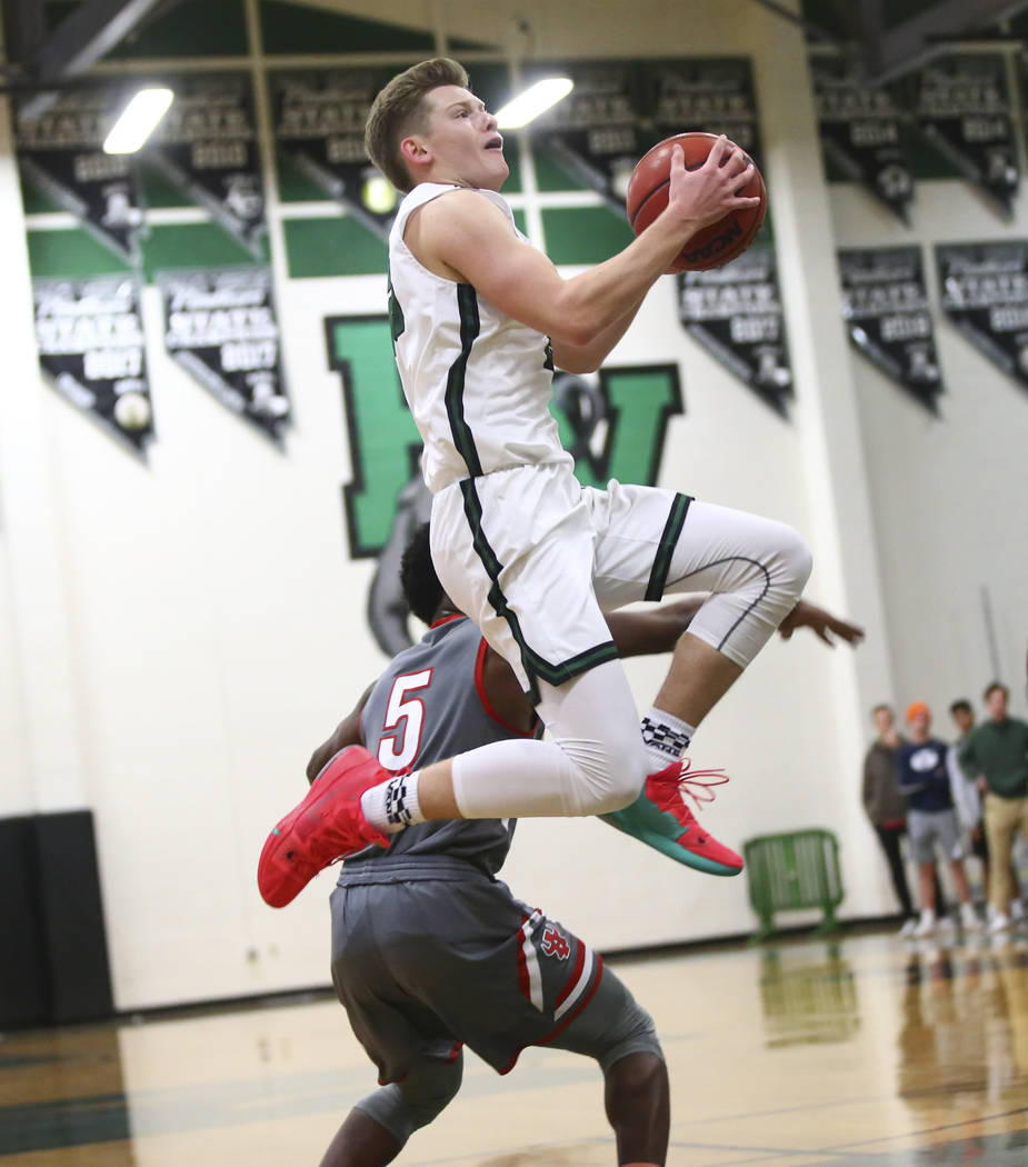 Palo Verde’s Kade Madsen (23) goes to the basket against Arbor View during a basketbal ...