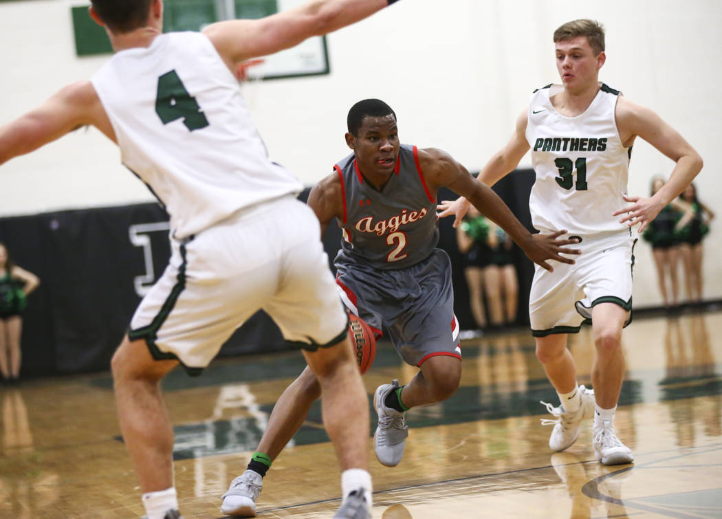 Arbor View’s Favour Chukwukelu (2) drives the ball past Palo Verde’s Jason Condr ...