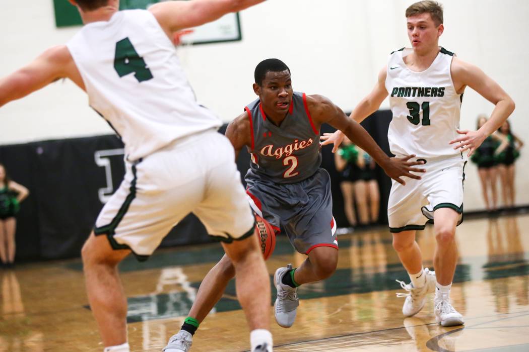 Arbor View’s Favour Chukwukelu (2) drives the ball past Palo Verde’s Jason Condr ...