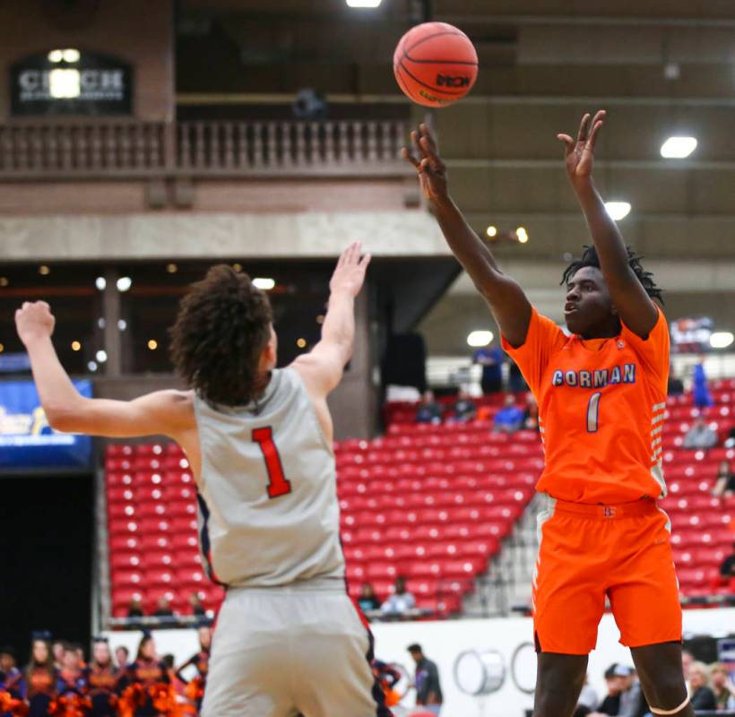 Bishop Gorman’s Will McClendon (1) shoots over Findlay Prep’s Blaise Beauchamp ( ...