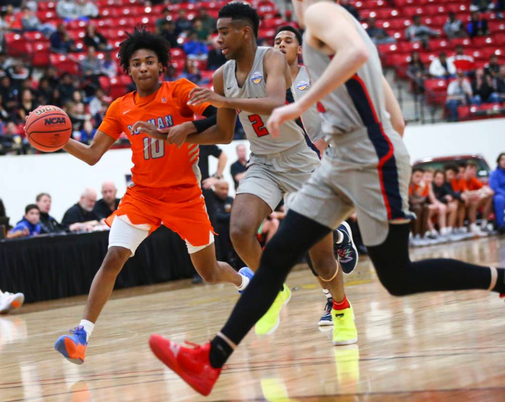 Bishop Gorman’s Zaon Collins (10) drives the ball against Findlay Prep’s Aston S ...