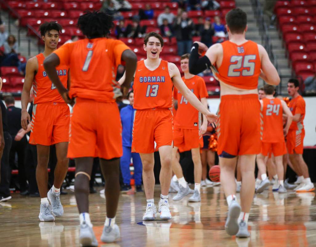 Bishop Gorman’s Braden Lamar (13) celebrates his team’s win against Findlay Prep ...