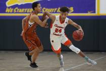 Chaparral’s Sameal Anderson (24) dribbles the ball past Legacy’s Andrew Garcia ( ...