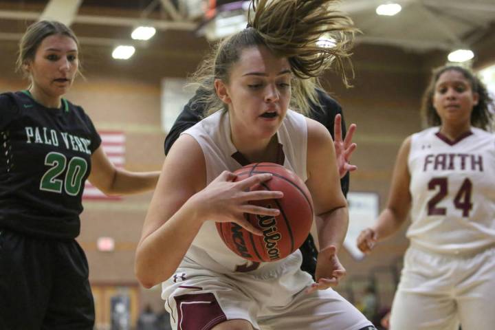 Faith Lutheran’s Kelsey Howryla (34) shields the ball during a game against Palo Verde ...