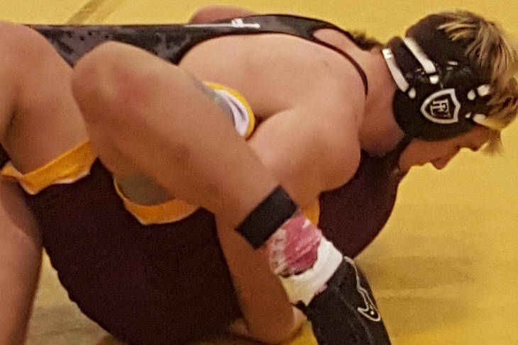 Faith Lutheran’s Connor Bourne prepares to pin Eldorado’s Marques Anaya-Casarez ...