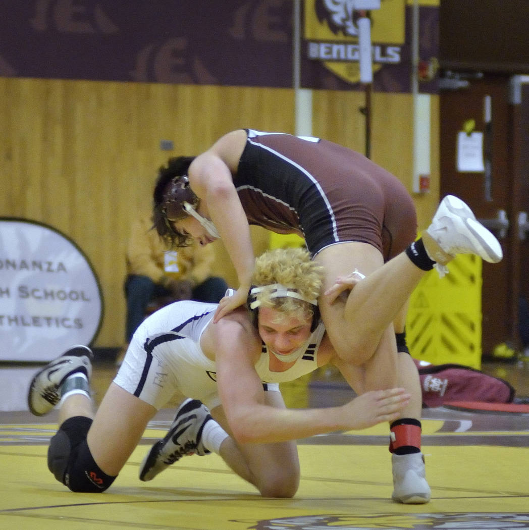 Daniel Rodriguez of Cimarron-Memorial High School, top, and Carson Cook from Faith Lutheran ...