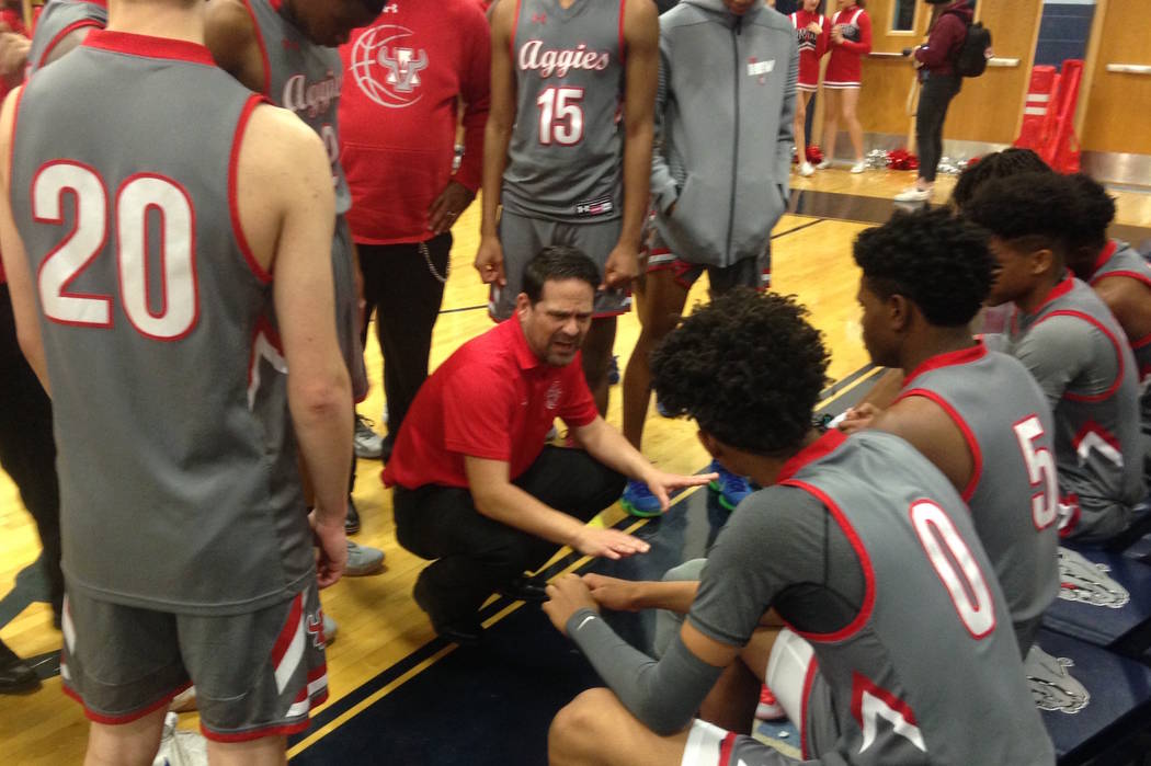Arbor View coach Dustin Clayton gives instructions during a timeout in the first quarter of ...