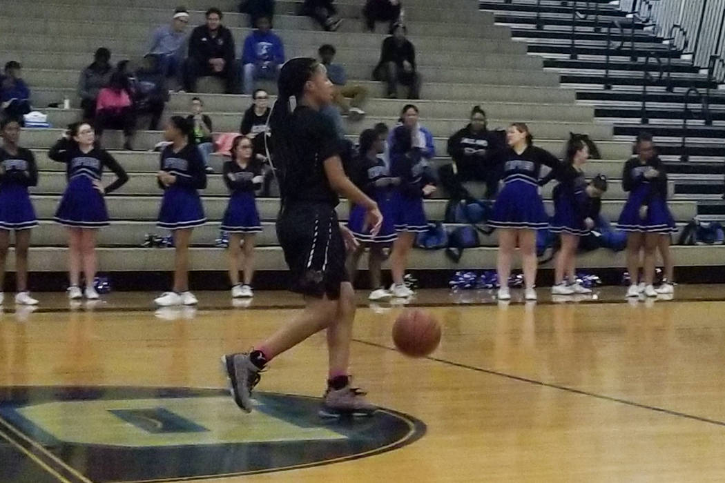 Cimarron-Memorial’s Yesenia Wesley-Nash brings the ball down the floor on Tuesday at D ...