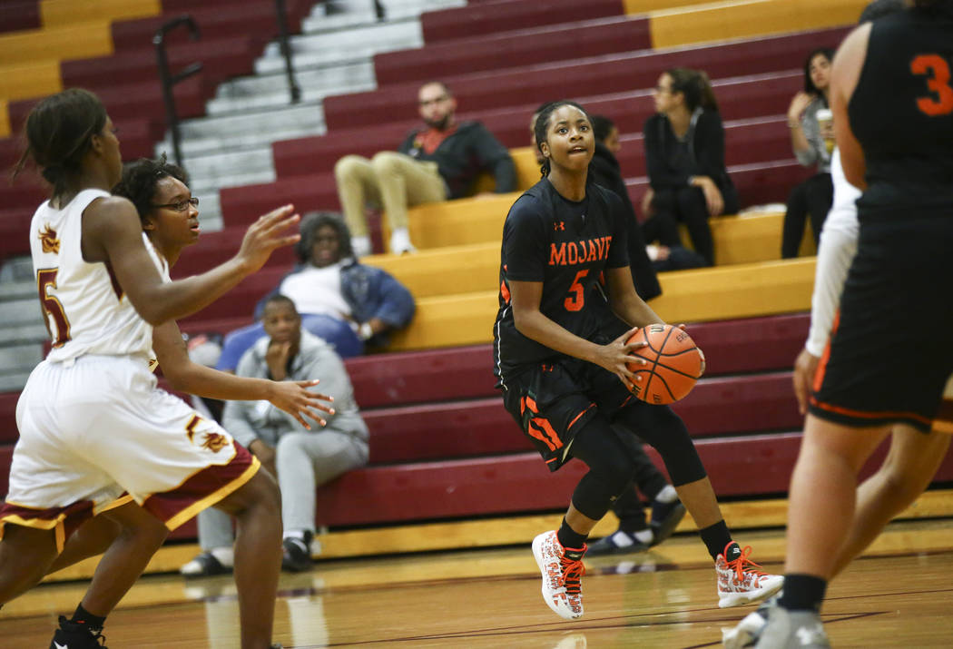 Mojave’s Alecia Kelly (5) looks to shoot the ball during the second half of a basketba ...