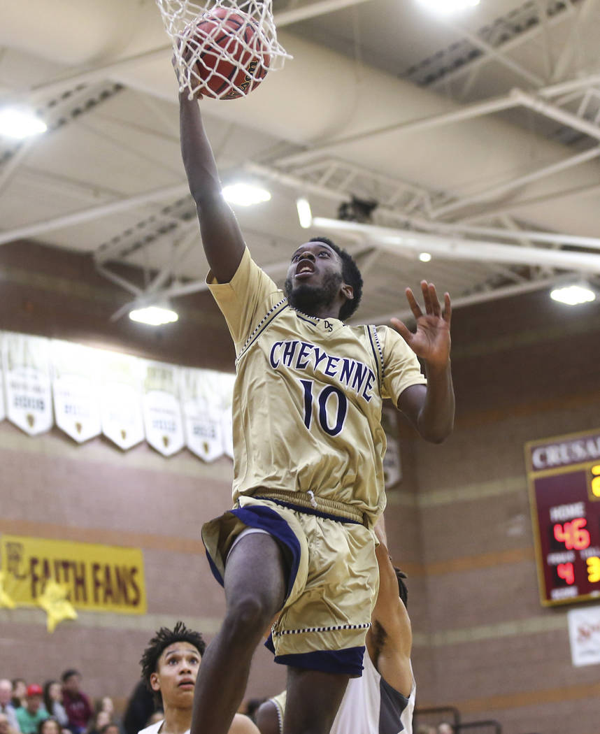 Cheyenne’s De’Kquante Hayes (10) goes to the basket during the second half of a ...