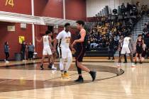 Clark senior Antwon Jackson plays defense in the third quarter of a 69-47 victory over Liber ...