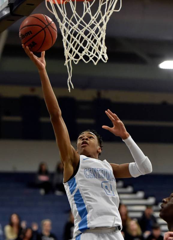 Centennial’s Chris Dockery shoots against Palo Verde during a high school basketball g ...