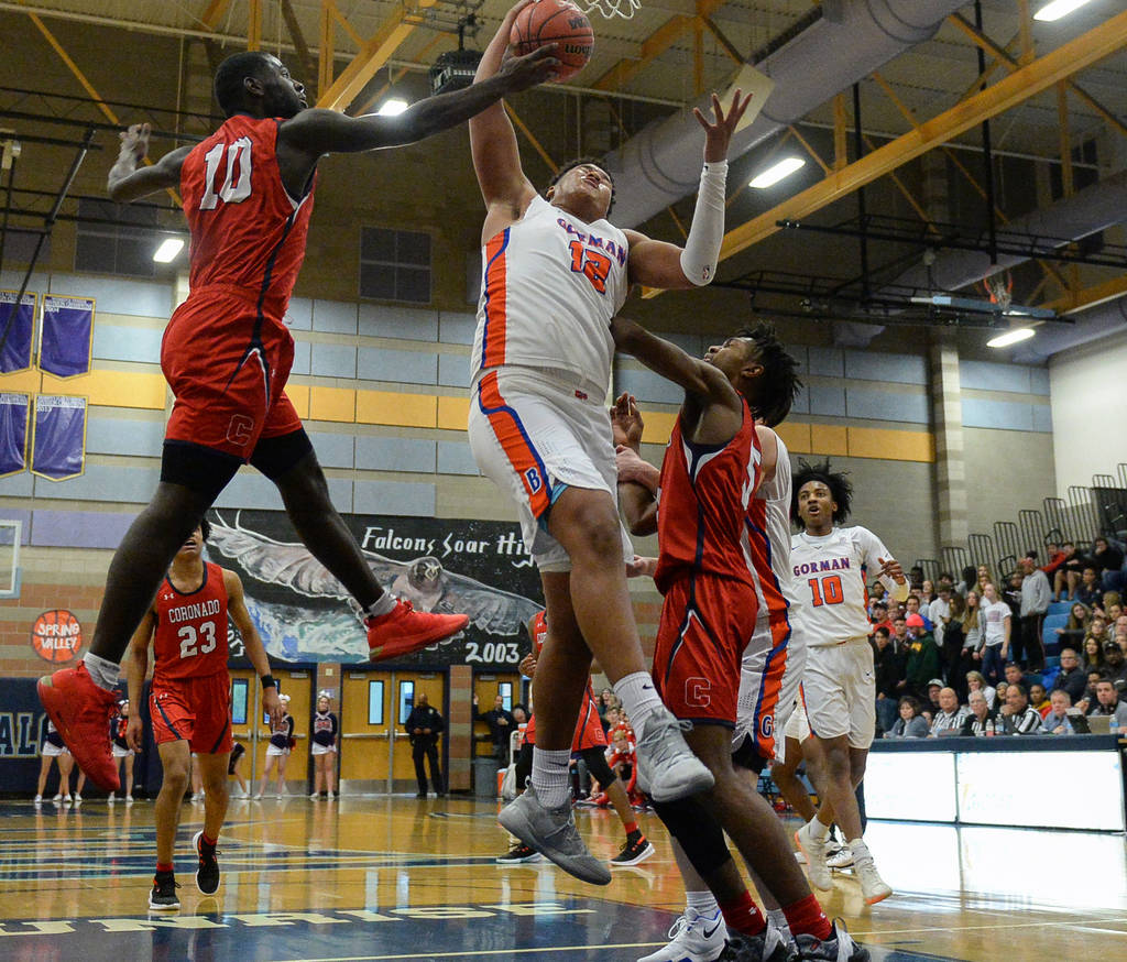 Coronado’s Tyrell Hunt (10) knocks the ball out of the hands of Bishop Gorman’s ...