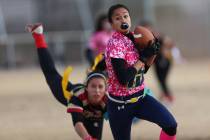 Green Valley junior Jazlyn Camacho (15) makes an interception against SECTA in the flag foot ...