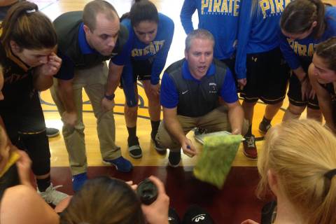 Moapa Valley coach Brandon Jones gives instructions between the first and second quarter of ...