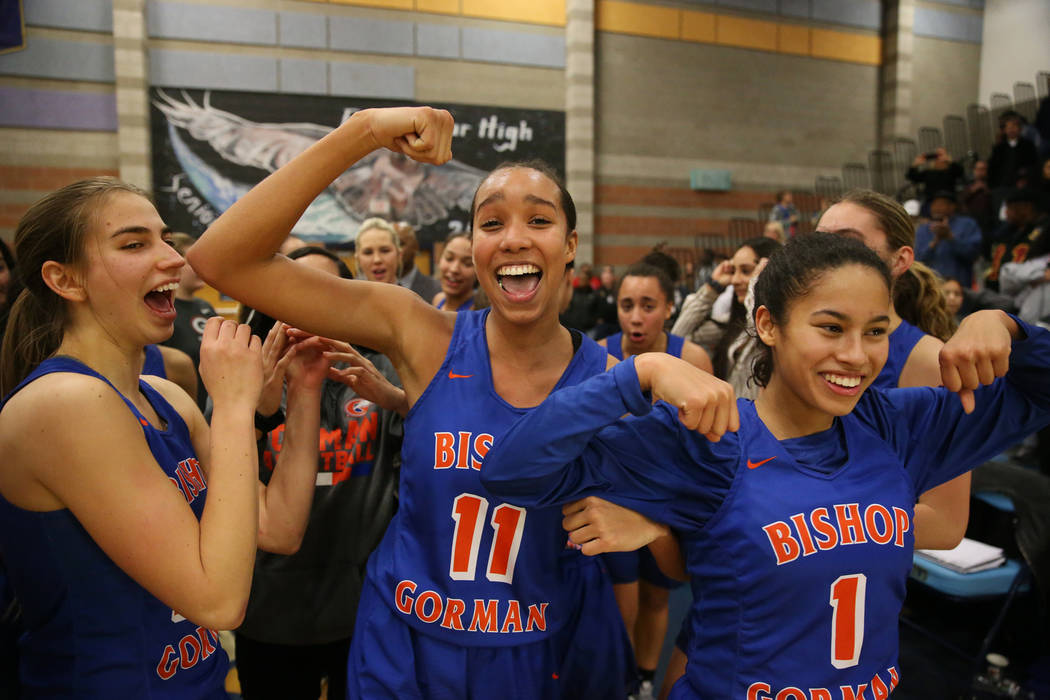 Bishop Gorman’s Lexi Kruljac (22), Olivia Smith (11) and Caira Young (1), celebrate th ...