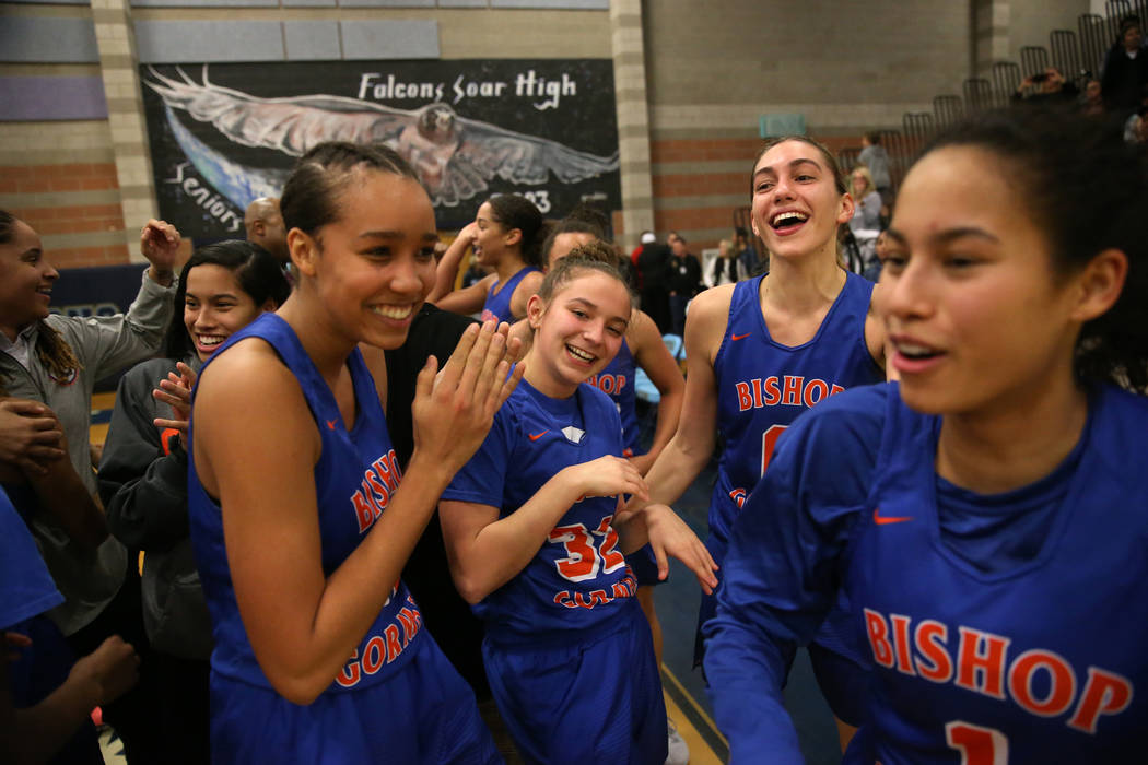 Bishop Gorman celebrates their win against Desert Oasis in the Desert Region girls basketbal ...