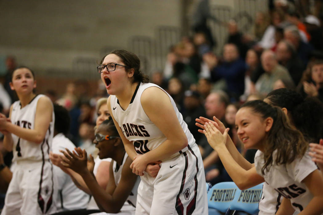 The Desert Oasis bench including Arrianna Spring (20), center, reacts after a play against B ...