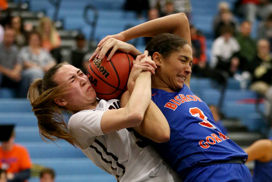 Desert Oasis’ Sierra Mich’l (30) fights for the ball against Bishop Gorman&#8217 ...