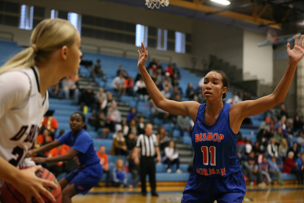 Bishop Gorman’s Olivia Smith (11) defends against Desert Oasis’ Melissa Simmons ...