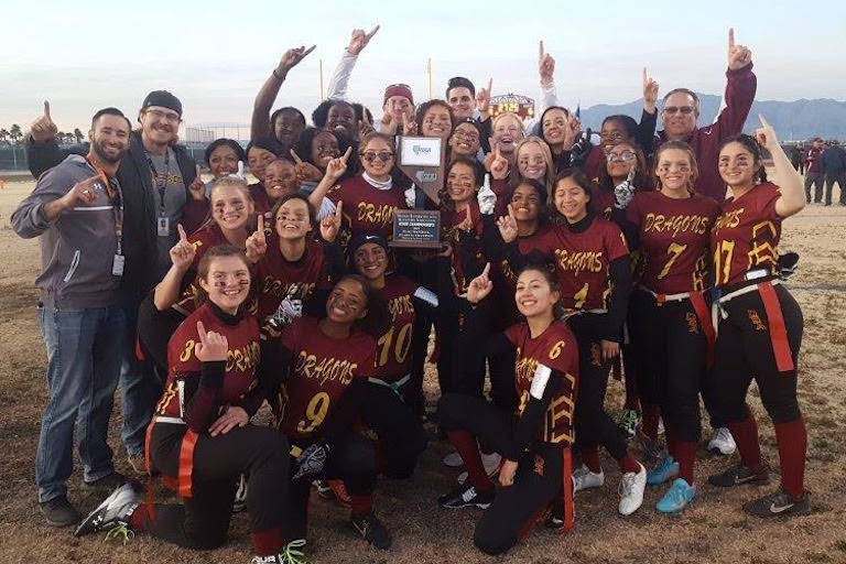 Del Sol poses with the Class 3A state championship trophy after defeating Virgin Valley, 19- ...