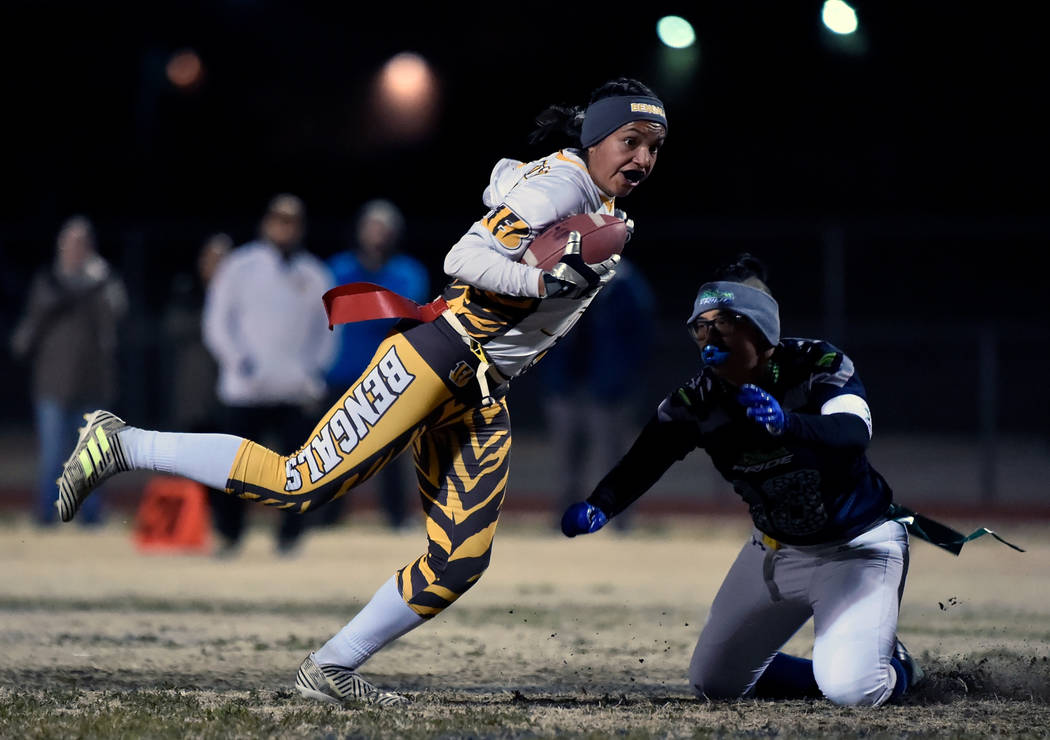 Bonanza’s Ashley Vasquez (75) avoids a tackle from Green Valley’s Anna Marie Arc ...