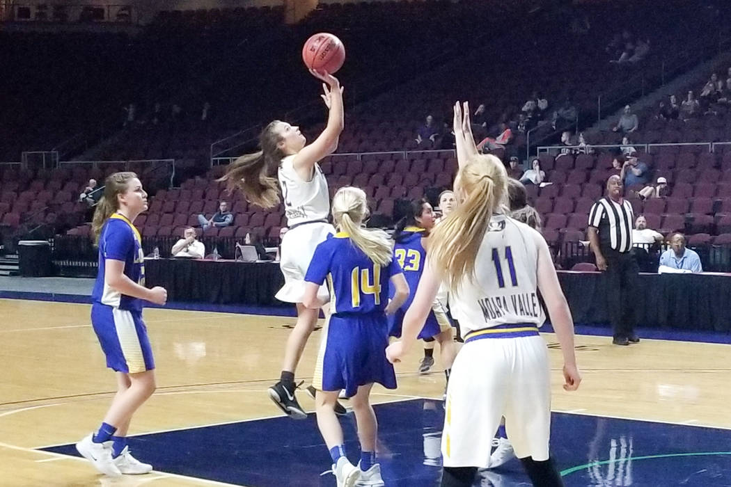 Moapa Valley’s Lainey Cornwall takes a shot against Lowry in the Class 3A state semifi ...