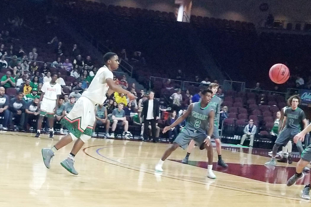 Mojave’s Dante Ingram fires a pass against Churchill County in the Class 3A state semi ...