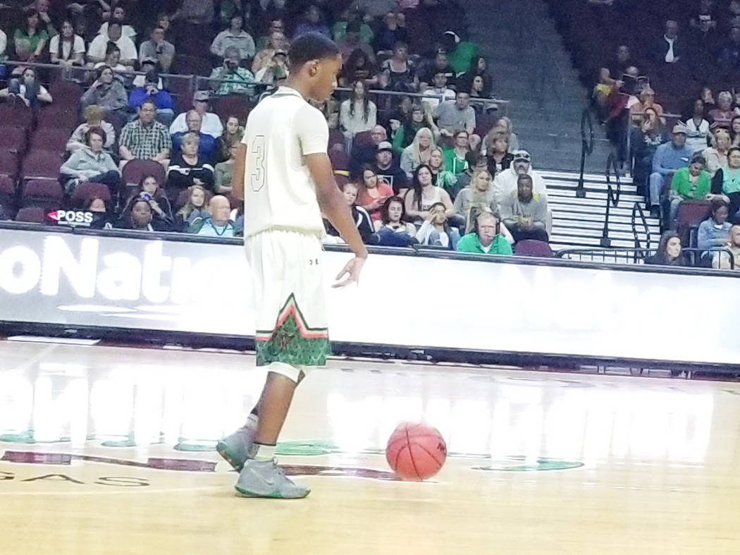 Mojave’s Dante Ingram brings the ball down the floor in the Class 3A state semifinals ...