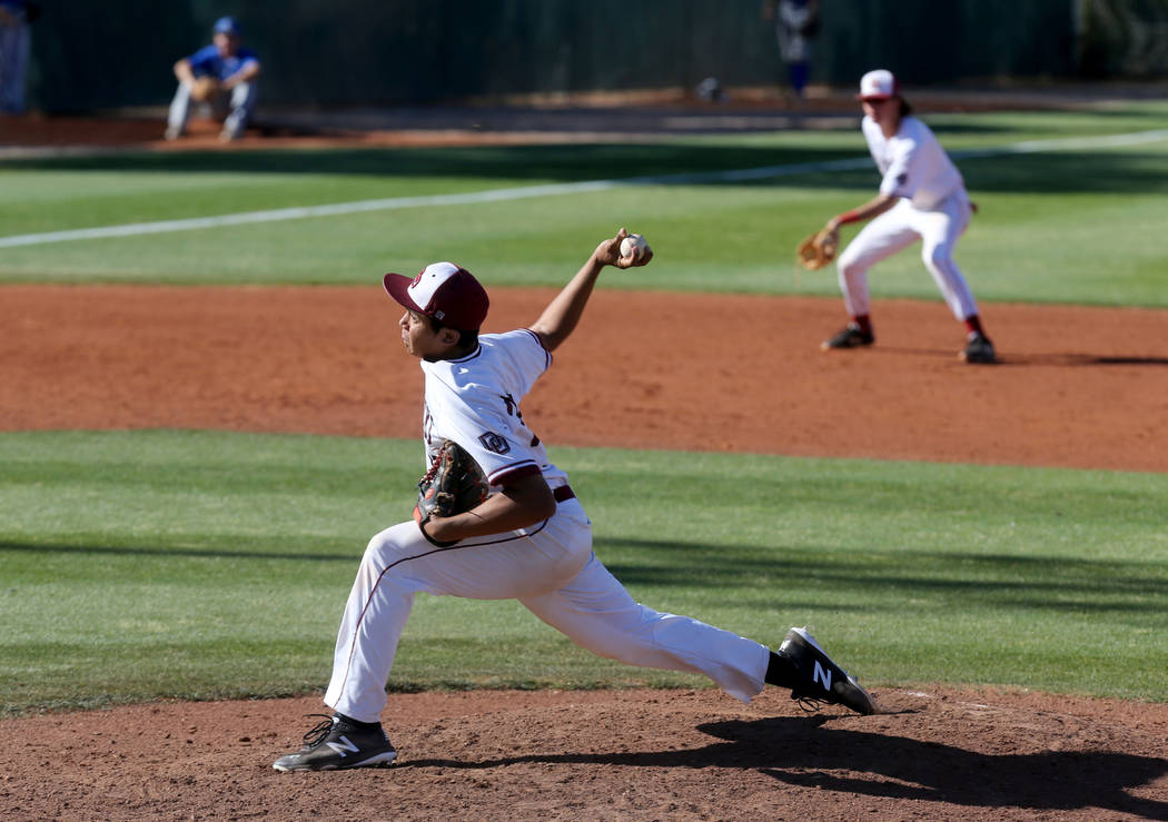 Desert Oasis pitcher Aaron Roberts (25) throws against Bishop Gorman in the fourth inning of ...