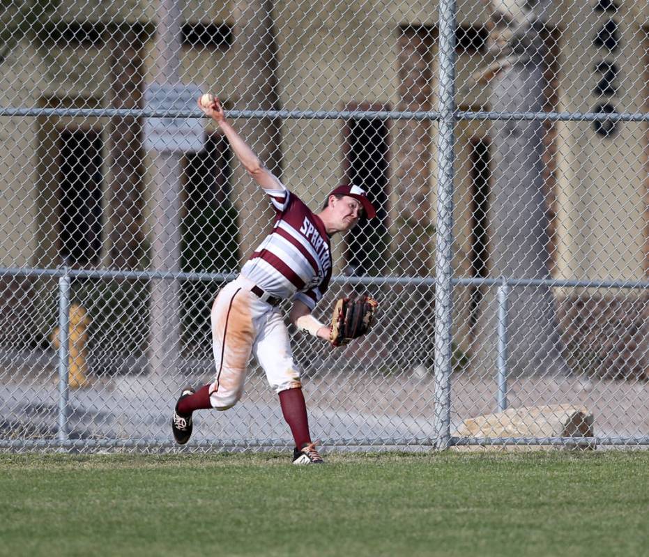 Cimarron-Memorial ourfielder Anthony Ortiz (12) throws in against Silverado in the fourth in ...