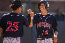 Coronado’s Thomas Planellas (25) congratulates teammate Jett Kenyon (8) after scoring ...