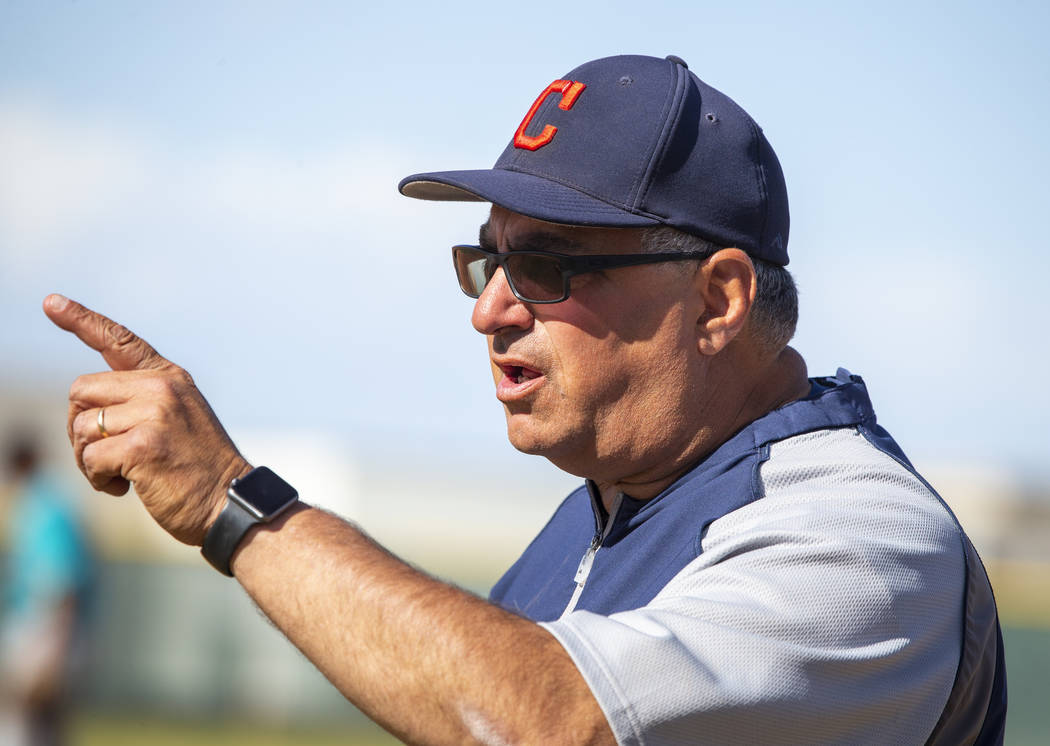 Coronado head coach Rich Santigate gives instruction a player versus Silverado during their ...