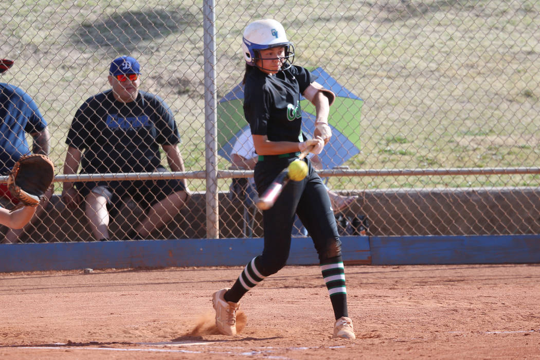 Green Valley’s Alyssa Vigil (8) connects with the ball for a single against Foothill i ...