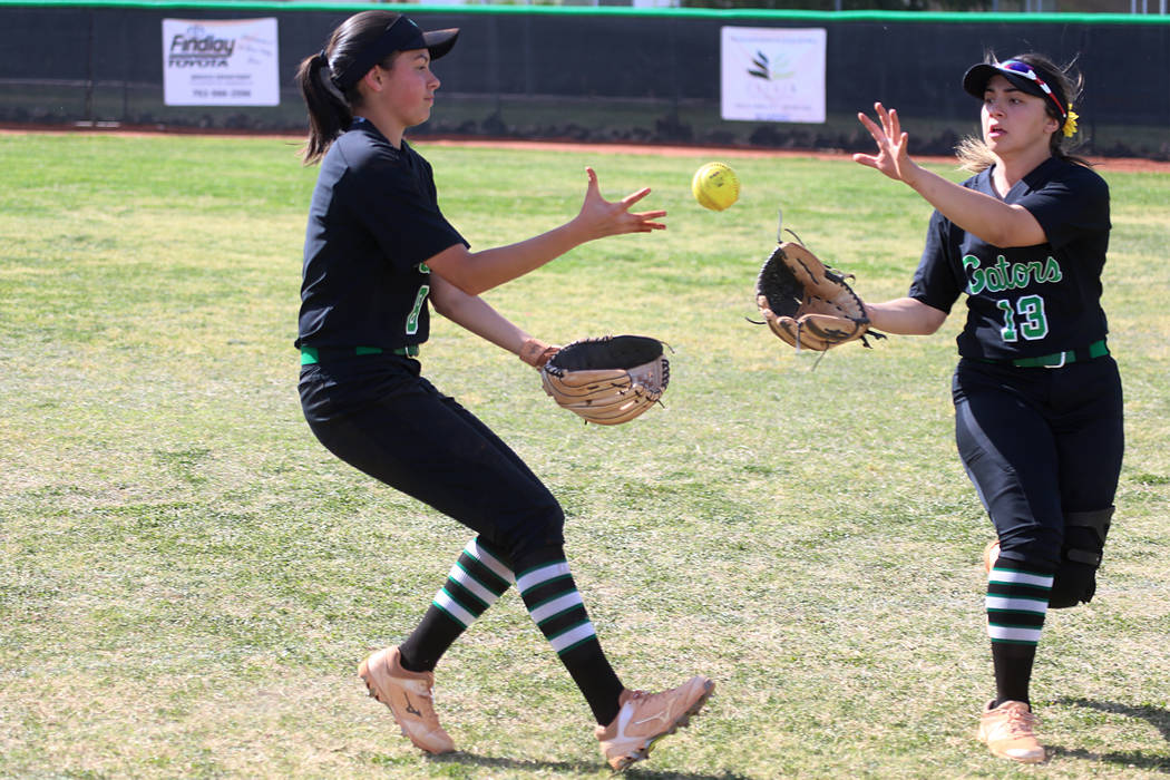 Green Valley’s Alyssa Vigil (8), left, and Cinthia Garcia (13), watch as the ball drop ...