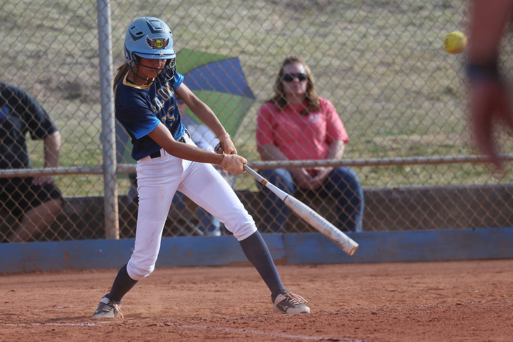 Foothill’s Layla Que (15) connects will the ball for a single against Green Valley in ...