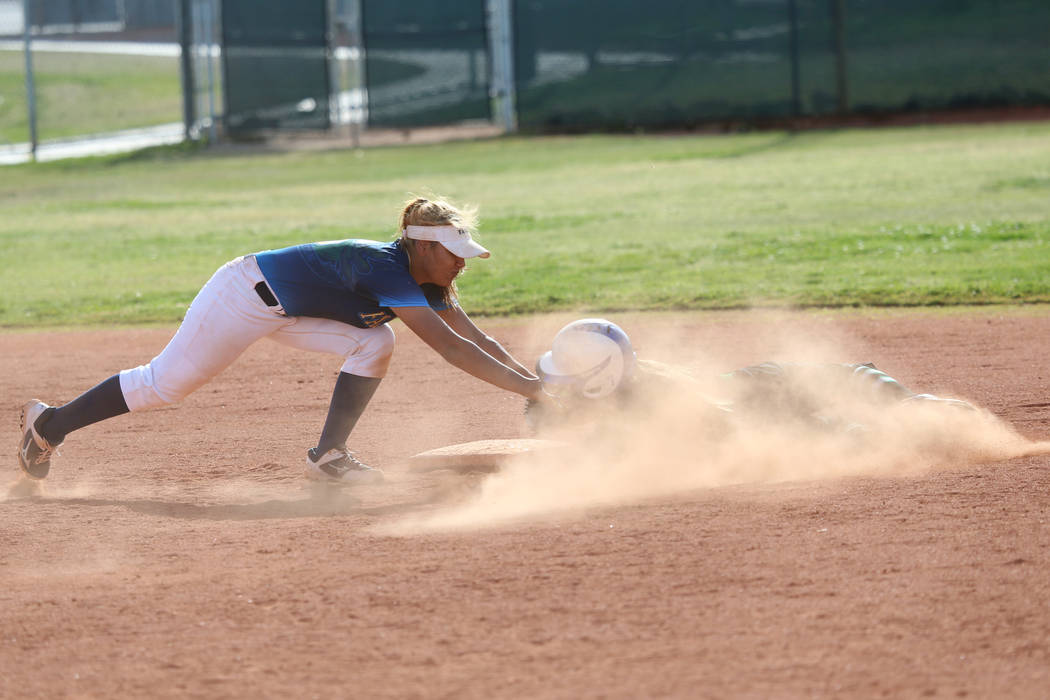 Foothill’s Angelina Rodriguez (6) tags out Green Valley’s Cindy Martinez-Escamil ...