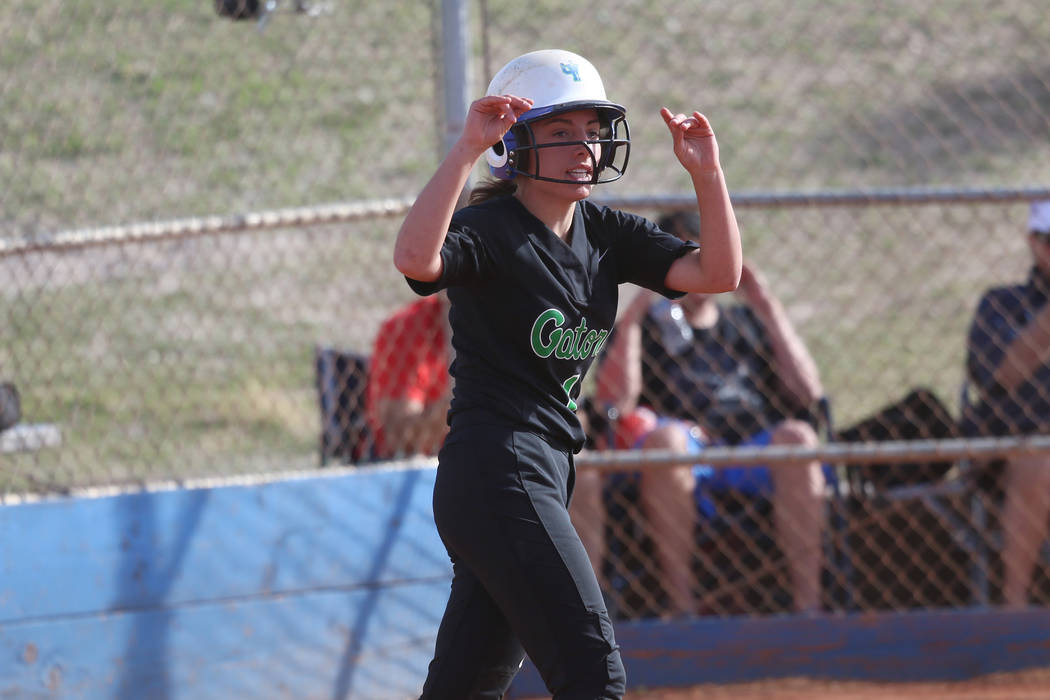 Green Valley’s Landree Galvin (4) celebrates after running home for a run against Foot ...