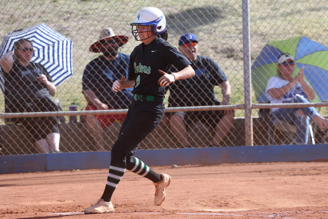 Green Valley’s Alyssa Vigil (8) runs home for a run against Foothill in the softball g ...