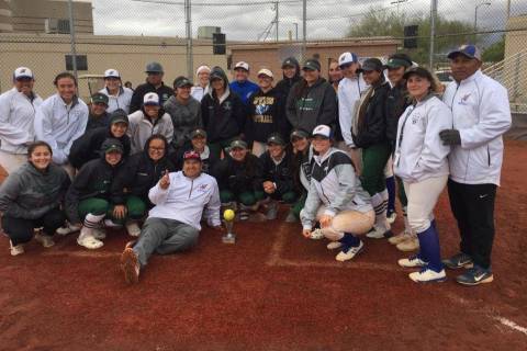 Members of the Sierra Vista and Schurr (California) softball teams pose for a group photo af ...