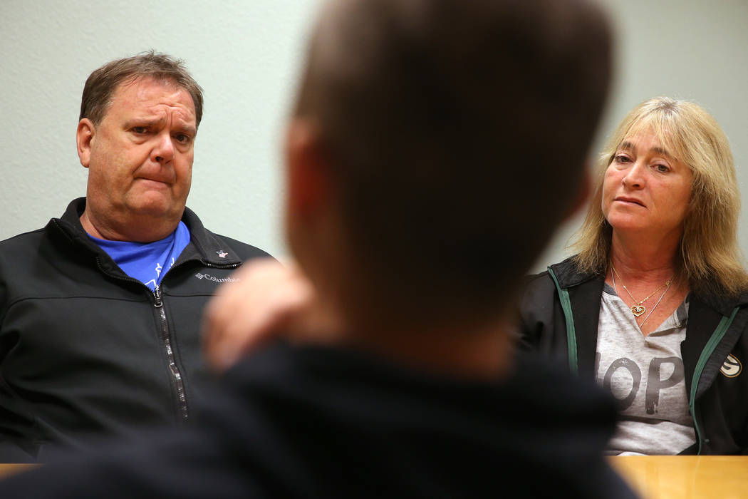 Chuck Reineck, left, and his wife Jeanette, participate in a support group meeting with Chris J ...