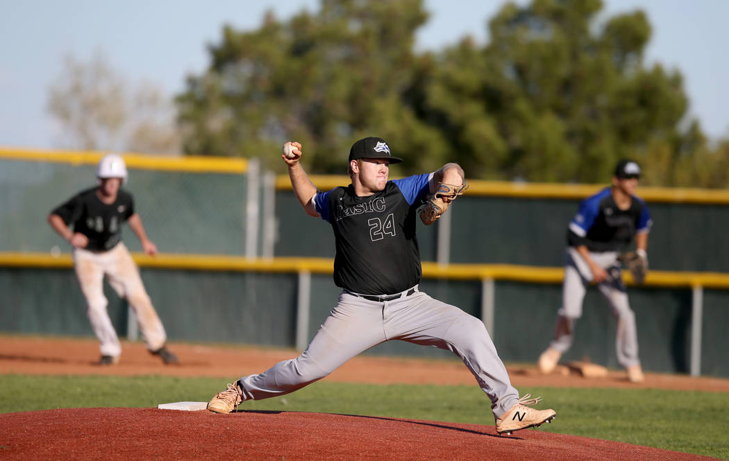 Basic pitcher Trace Evans (24) throws against Palo Verde in the seventh inning of their base ...